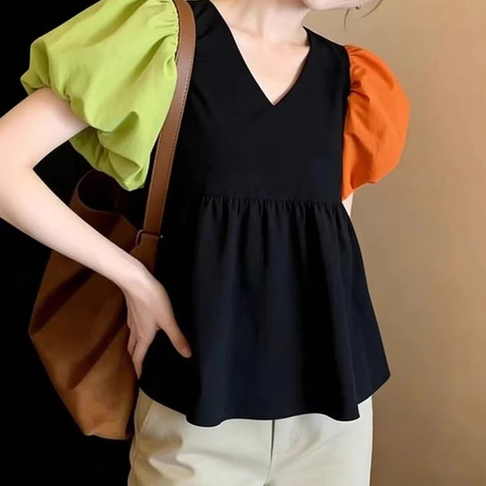 Contrast color bubble sleeve top fashionable, foreign, niche, high-end sense, super good-looking, black shirt woman