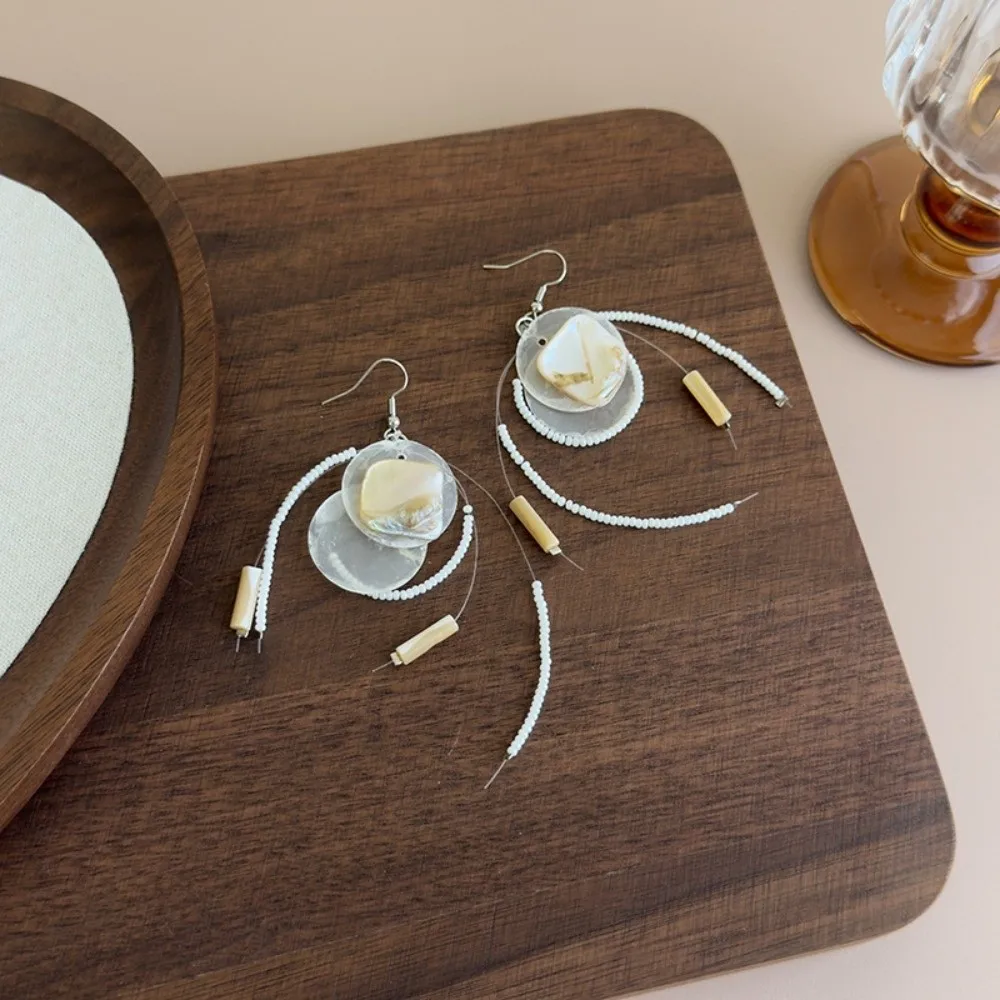 New Asymmetric Shell Tassel Earrings White Long Design Beads Dangle Earrings Ear Hooks Hollow Out Statement Earrings Gifts