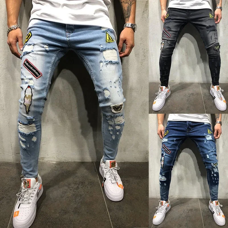 Pantaloni da uomo Hip Hop di fascia alta attillati con fori sottili Nuovi jeans slim con distintivo per uomo