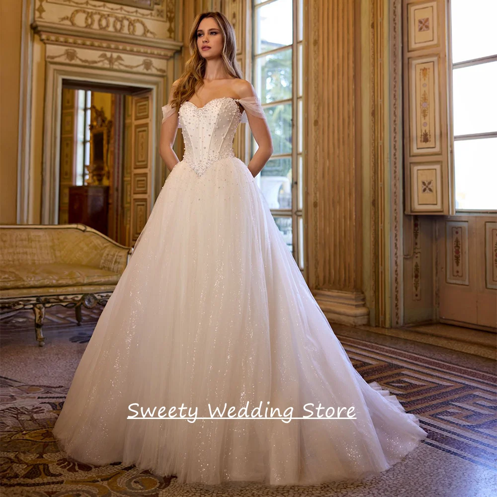 

Sparkling Wedding Dress Customized Sweetheart Off Shoulder Pearls Glitter Tulle Sweep Train A Line Corset Bridal Gown