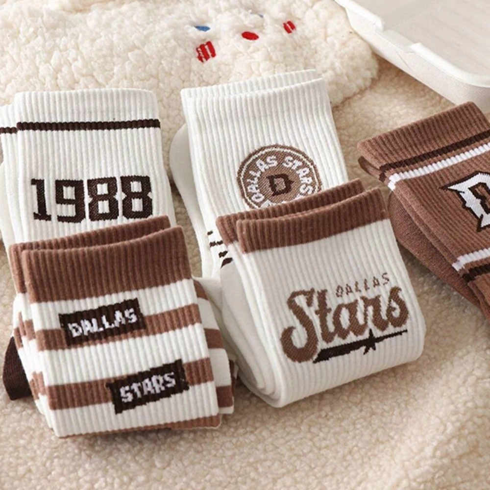 4 pairs of socks female spring and autumn students ins tide Korean version of all-in-one long tube lovers sports American suitab