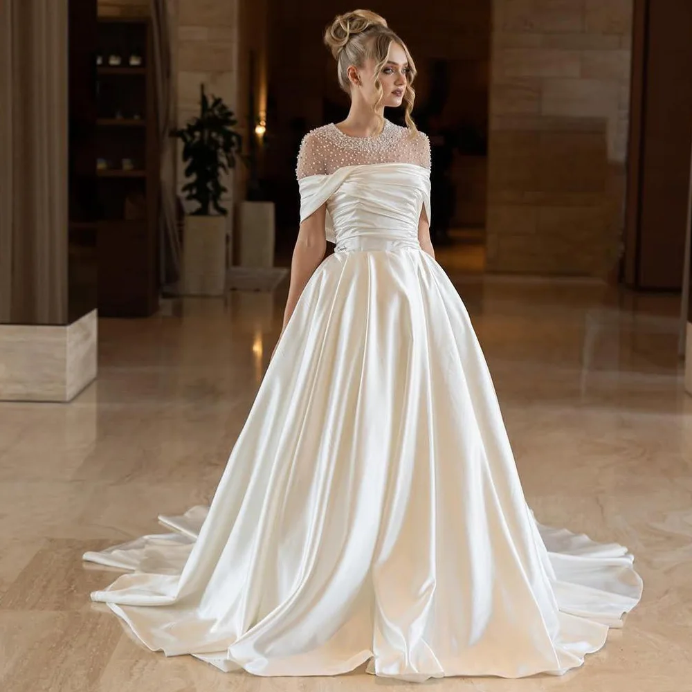 

Customized Sheer Neck Off the Shoulder Wedding Dress Pearls Embellished A Line Bridal Gown Pleat Satin vestidos de novia