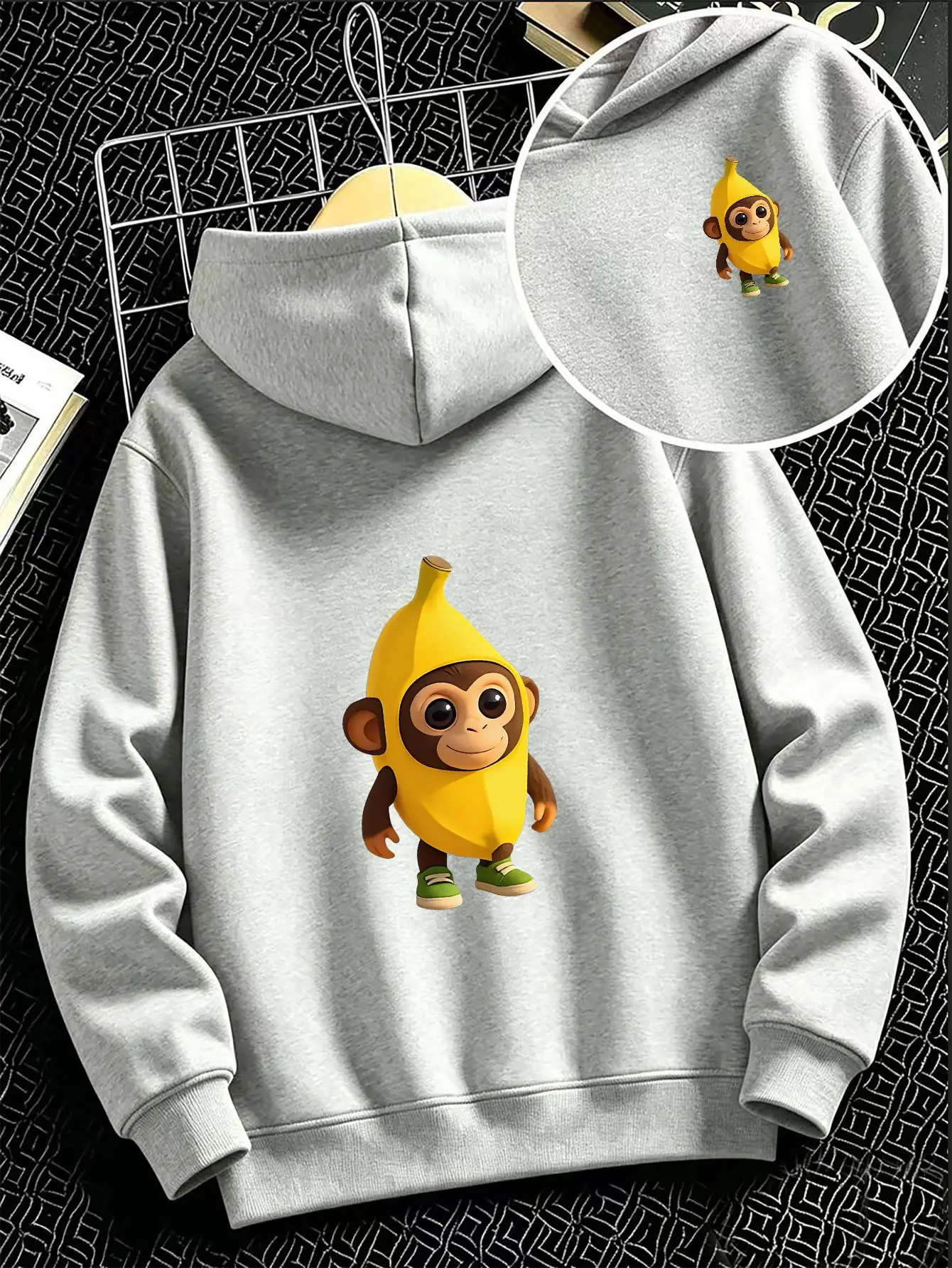 Children's hooded sweatshirt with cartoon monkey and banana print suitable for both boys and girls loose fitcute animal pattern.