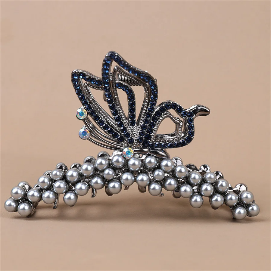 Fashionable pearl crystal butterfly clip women's high-end personalized shark clip large-size hair volume and hair accessories