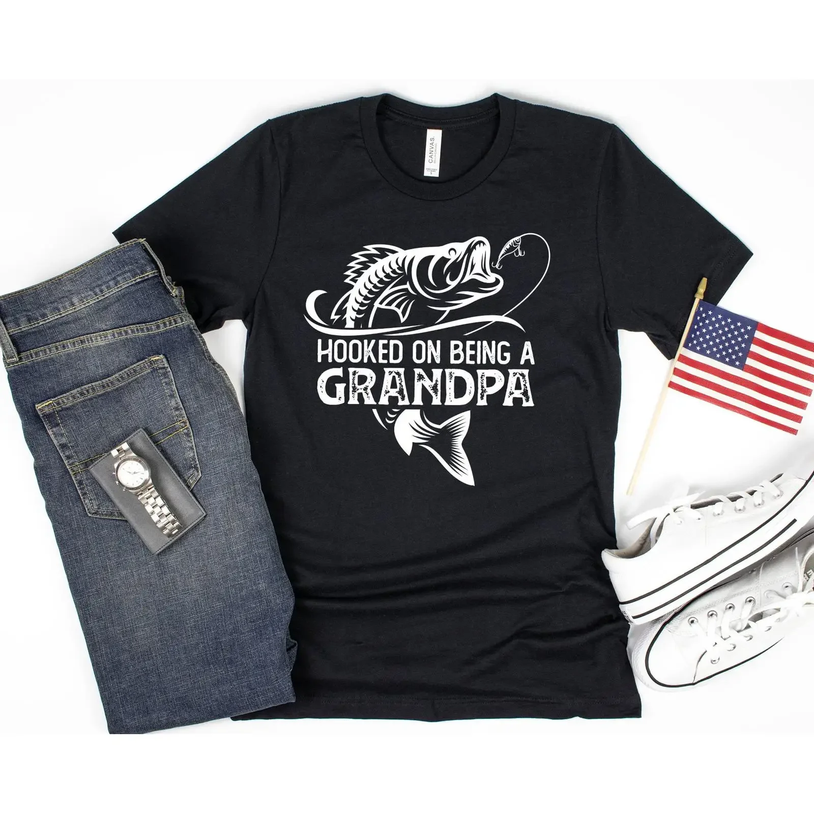 May include Black t shirt with a white graphic of fish hook and the text Hooked on being Grandpa vintage Washed