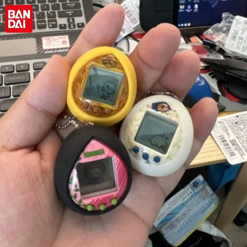 

Bandai Jurassic World Tamagotchi Tyrannosaurus Rex Triceratops Dinosaur Virtual Pets Electronic Pet Machine Toys Children Gi