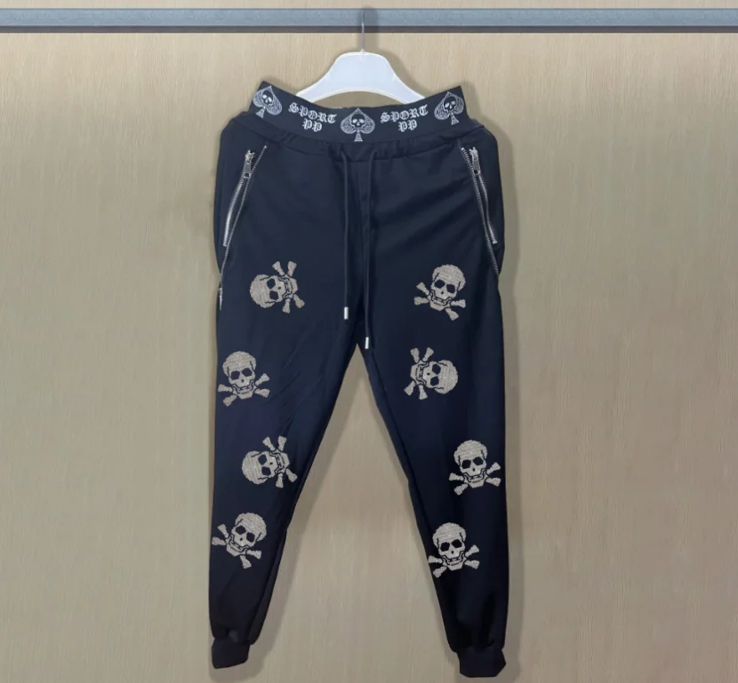 

Лучшие брендовые мужские дизайнерские спортивные штаны для бега свободного покроя с привлекательными деталями со стразами для улучшения повседневного использования.