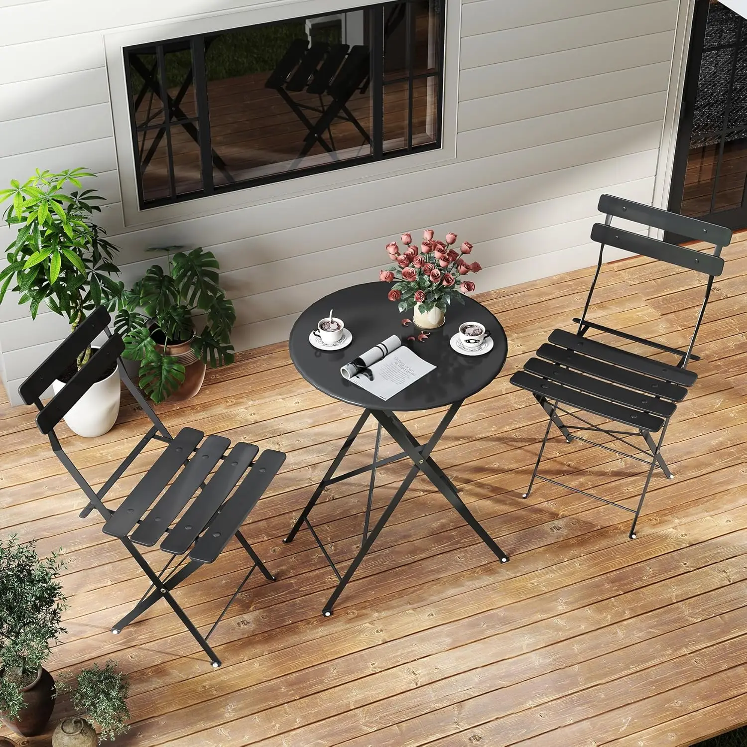 Space-saving black 3-piece foldable outdoor bistro set consisting of one folding coffee table and two matching chairs, ideal compact furniture for small balcony and private garden use view 2