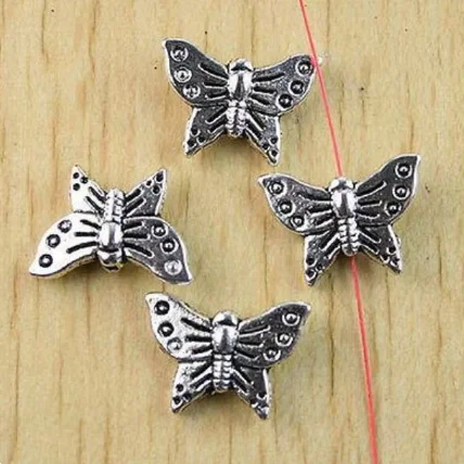 

20pcs 12x16mm Alloy matel tibetan silver 2sided butterfly shaped spacer bead HWH0974