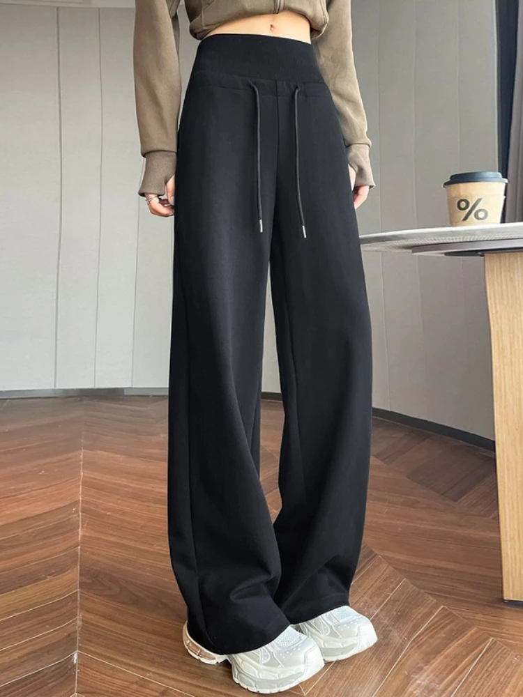 กางเกงวอร์มผู้หญิงทรงตรงเอวสูงสีเทาแบบมีเชือกผูก รุ่นใหม่ประจำฤดูใบไม้ร่วงปี 2025 ดีไซน์เรียบง่าย สวมใส่ได้หลากหลาย สไตล์ลำลอง สีดำ