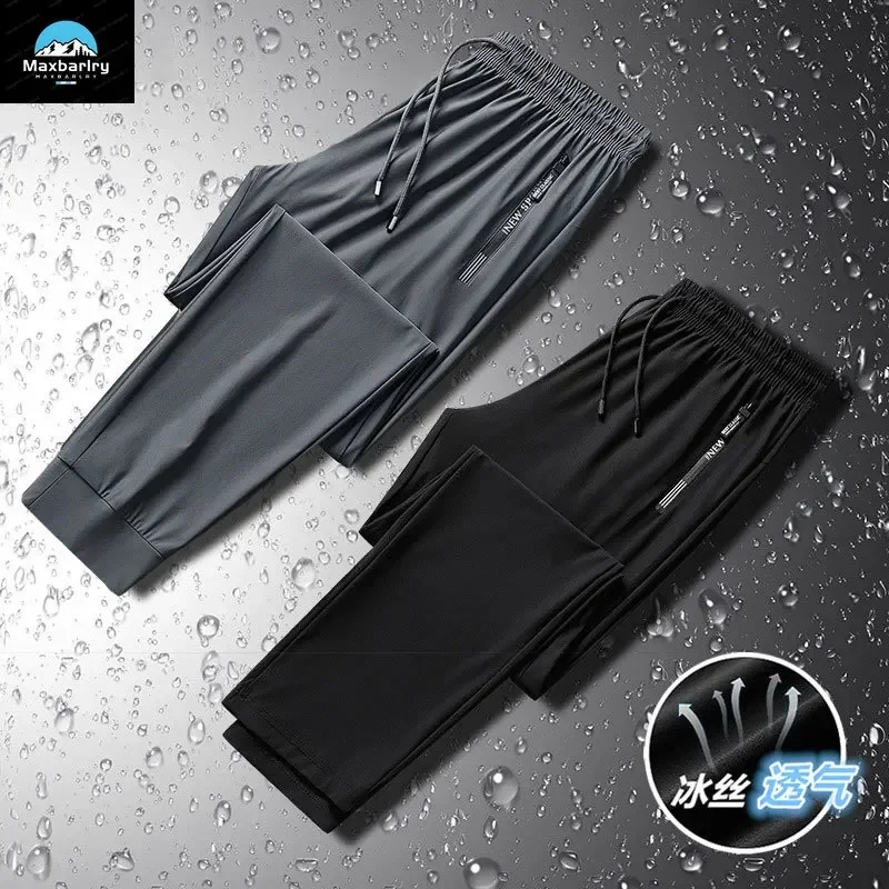 Calças casuais masculinas verão náilon impresso calças de seda gelo ultra-fino plus size calças esportivas elásticas soltas jogger