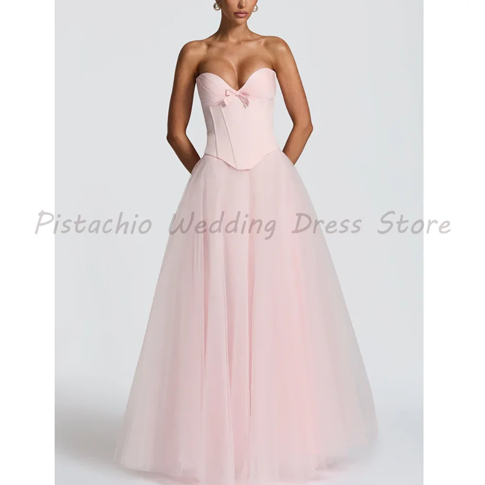 

Pink Strapless Corset Prom Dress 2026 Luxury Sweetheart Neck Bow A-Line Tulle Formal Evening Gown For Women