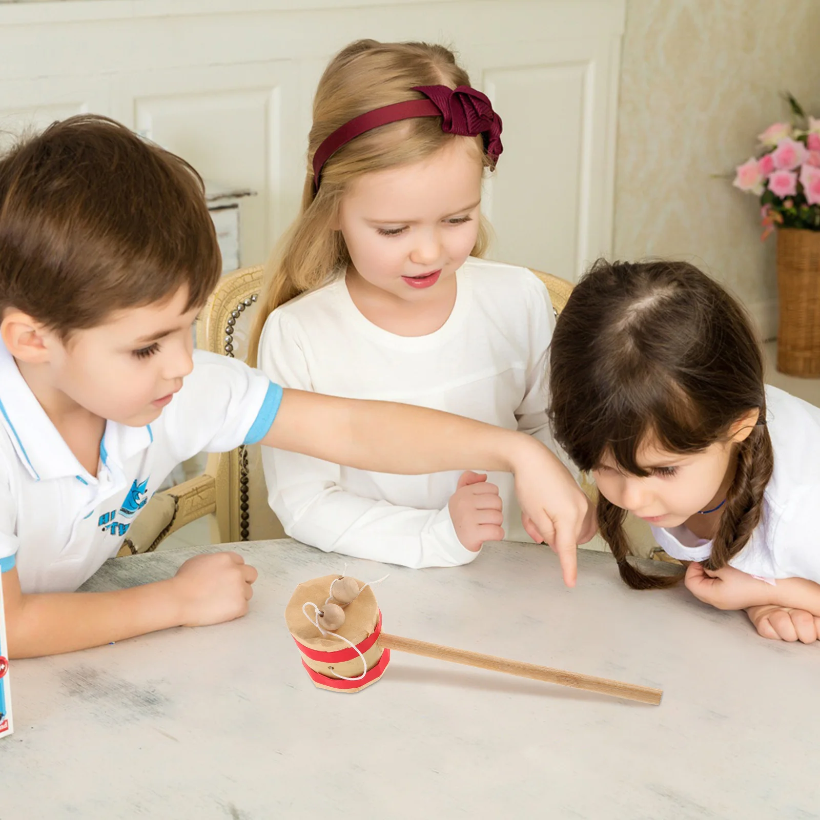 

Chinese Kids Rattle Drum Beige Natural Wood Handmade Spinning Drum Early Musical Development Educational Instrument Montessori