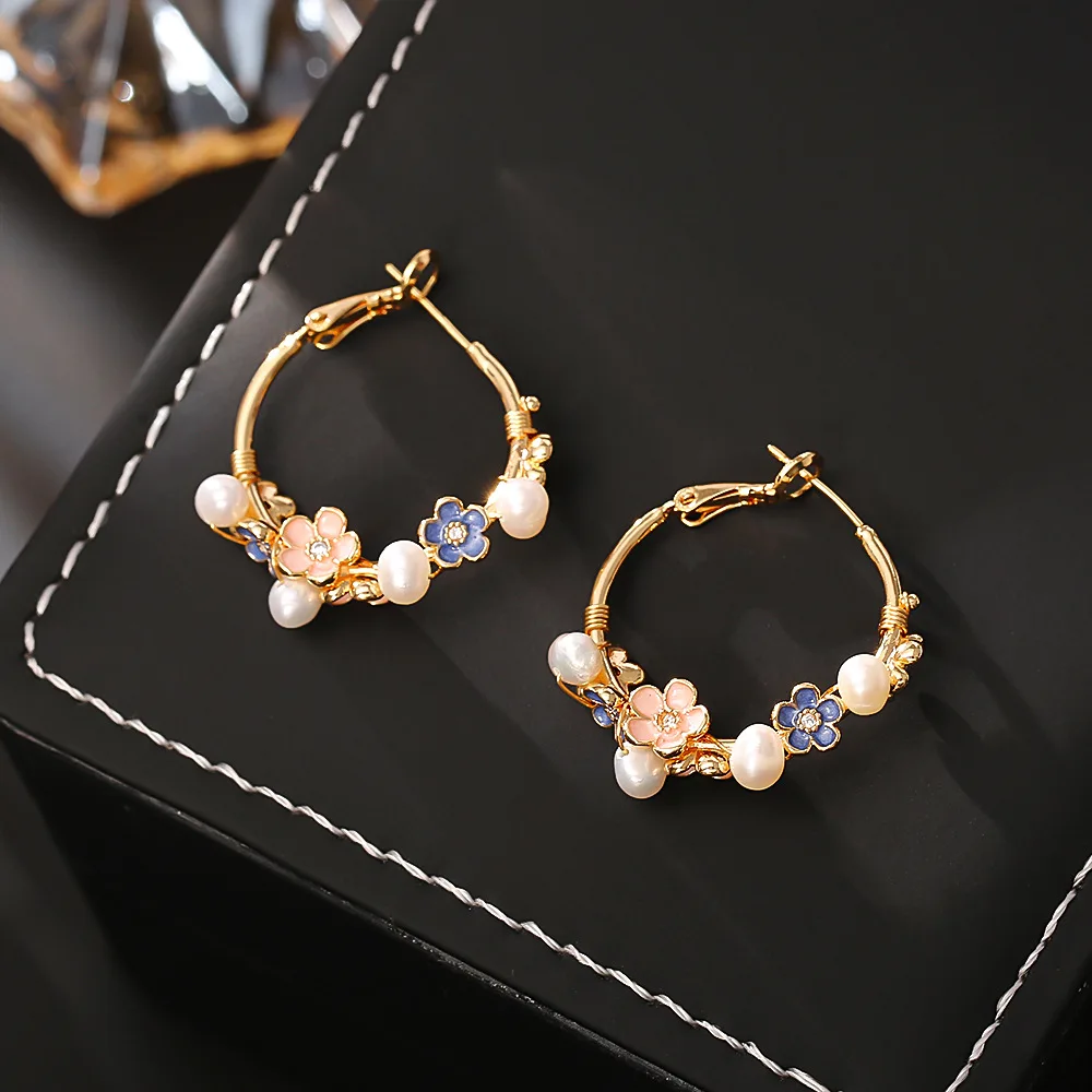 

Natural freshwater pearl flower earrings niche light luxury high-end small fresh earrings design exquisite fashionable earrings