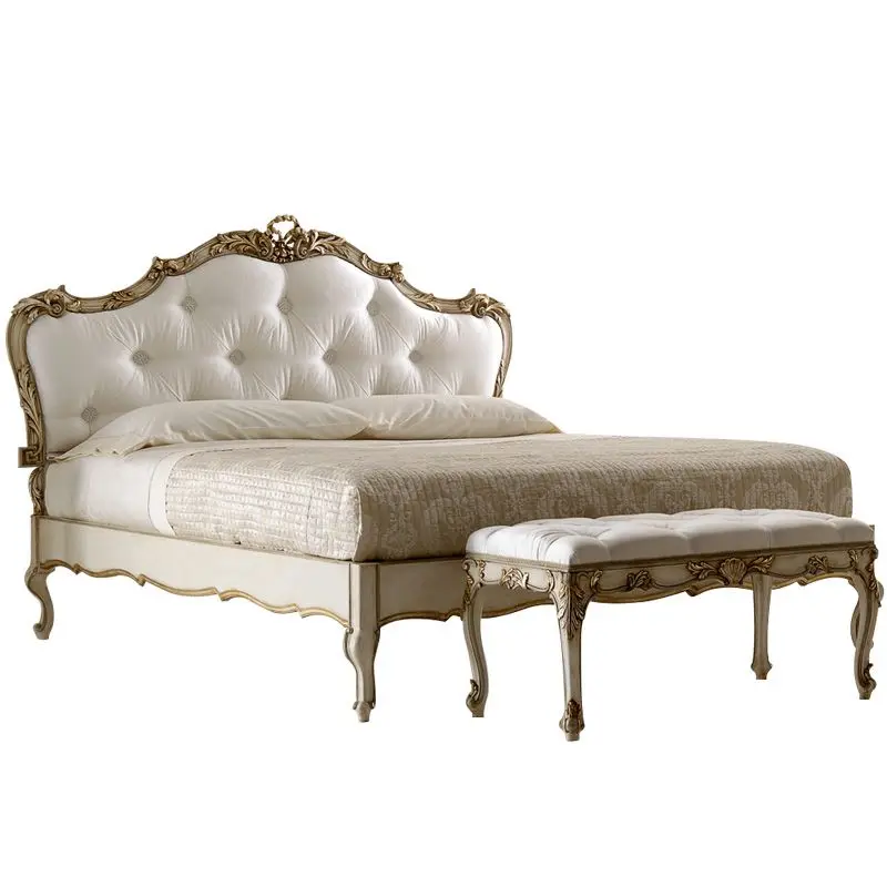 

Стильная кровать размера «king-size» из дерева с резьбой и кожаной обивкой, изготовленная на заказ.