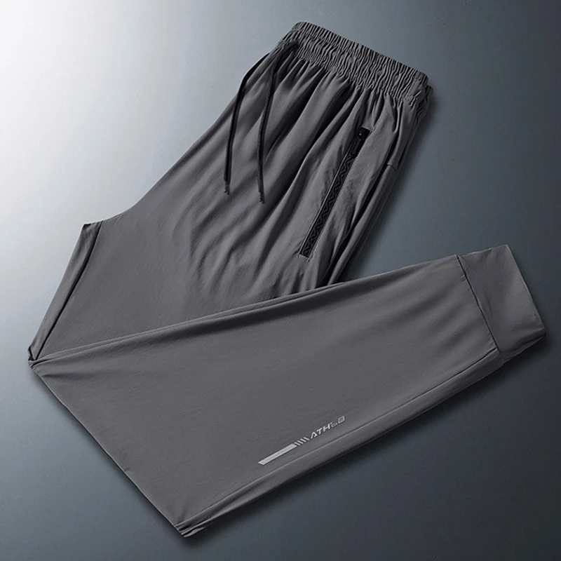 2024 Men\'s Versatile Stretch Quick Drying Pants Zipper Pocket Designer Casual Trousers Breathable Outdoor Joggers Summer Pants