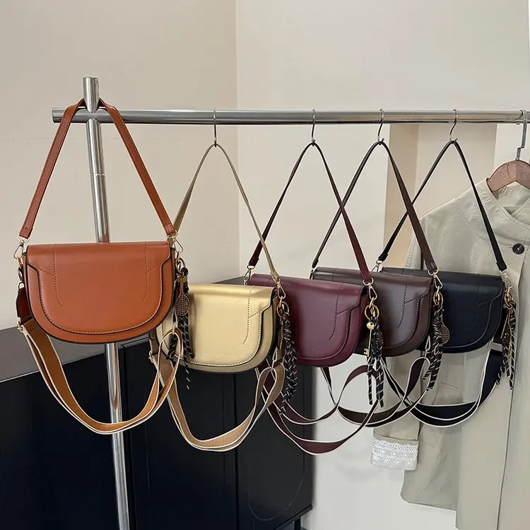 

Women's Saddle Shoulder Bag with Braided Strap & Tassel Charm Retro Style Daily Crossbody Purse