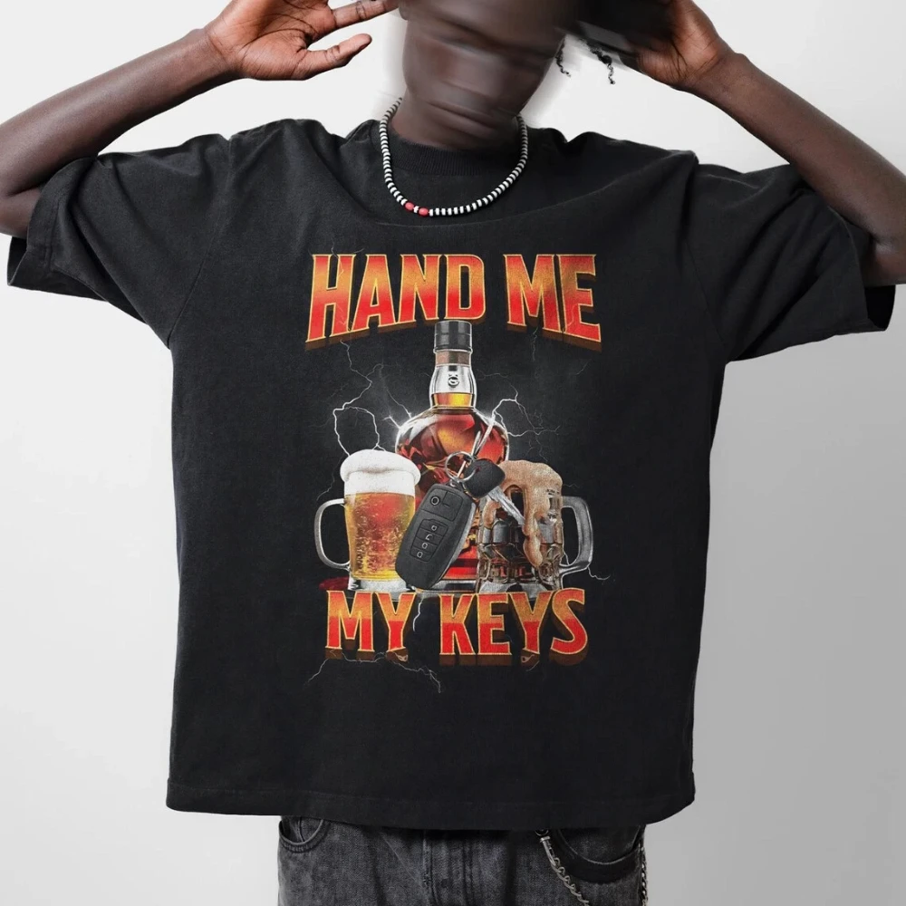 

Retro "Give Me the Keys" T-shirt, fun emoji design, loose fit, unisex, heavyweight pure cotton streetwear top.