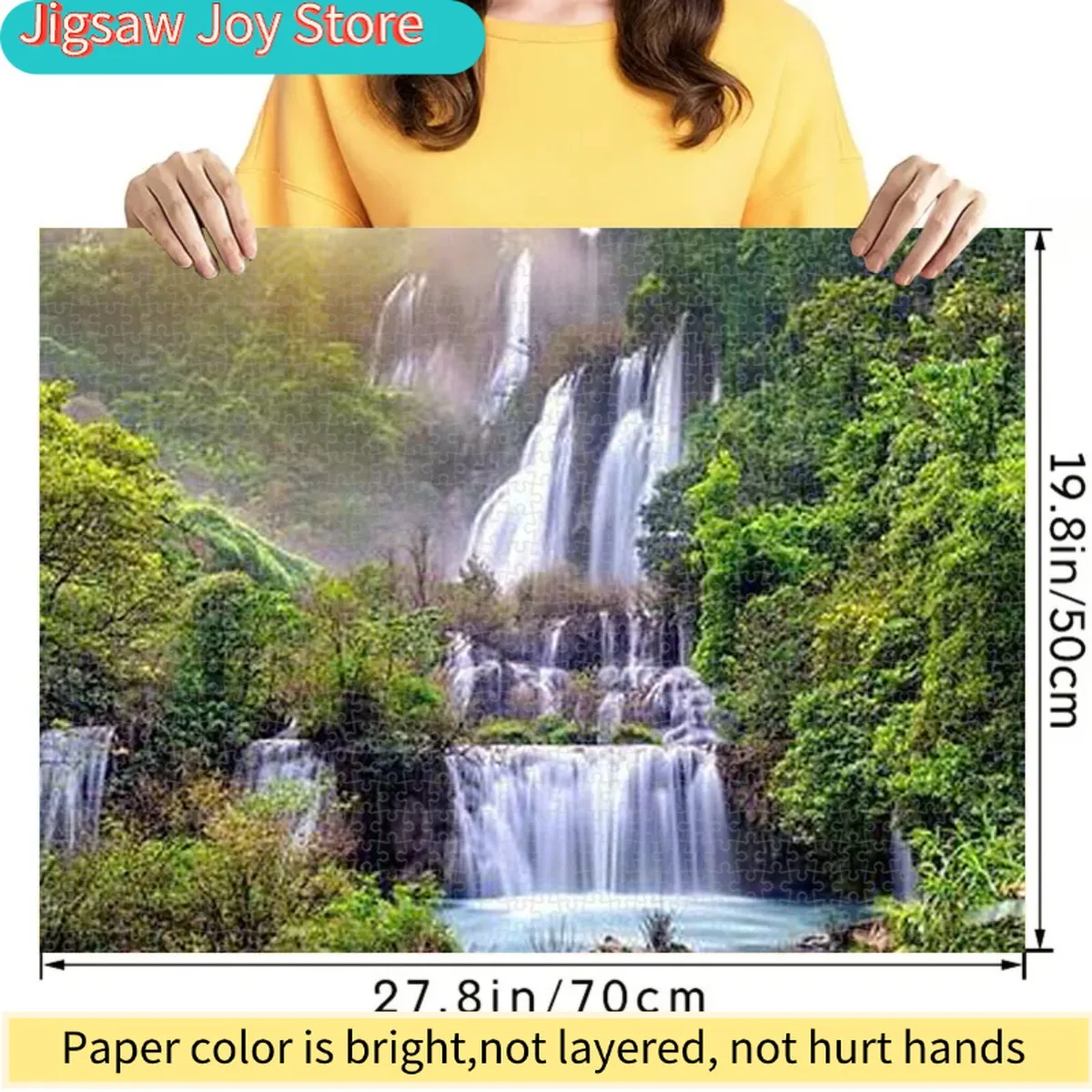 A 1000pcs Jigsaw Puzzle for Adults Featuring Cascading Waterfalls in The Mountains, Enveloped by Greenery And Sunlight. Ideal