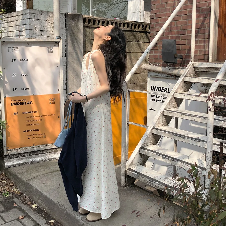 Słodka, elegancka letnia sukienka bez rękawów z kwiatowym nadrukiem, luźna, codzienna, damska, długa, rozkloszowana.