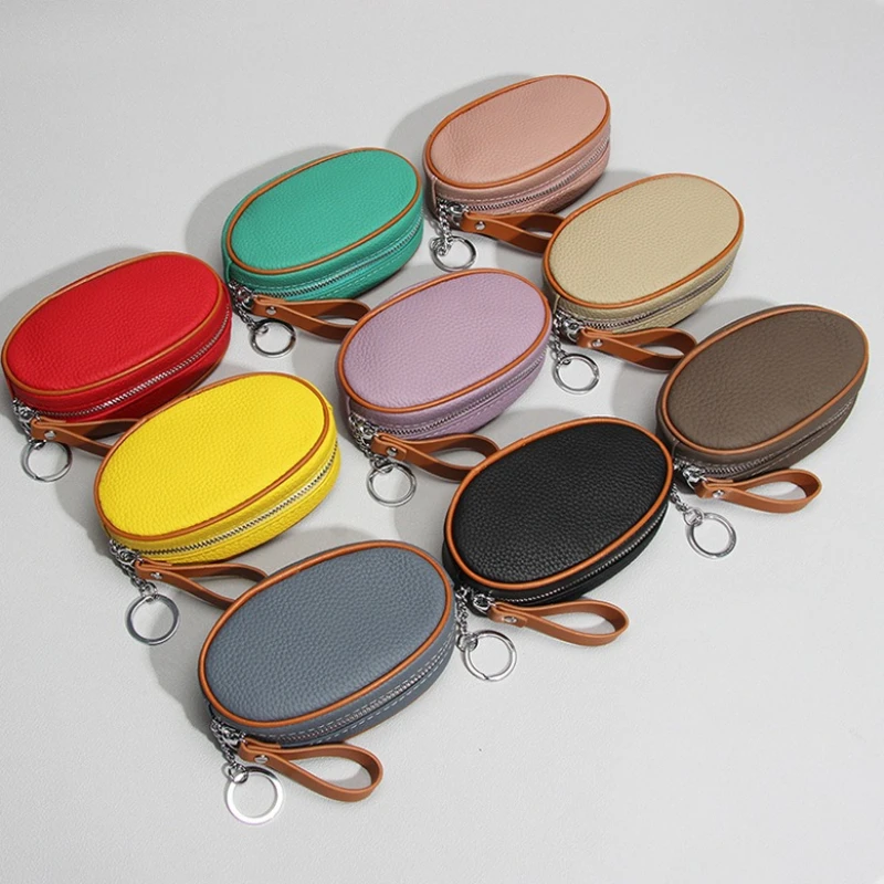 

Multi-Purpose Leather Oval Pouch - Zippered Coin Purses with Key Ring, Portable Storage for Earbuds, Lipstick & Small Essentials