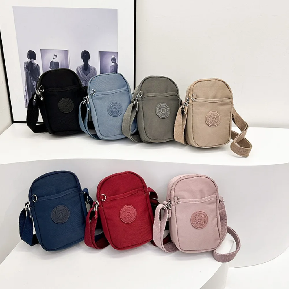 Bolsa de ombro de nylon para mulheres Multi camada Grande capacidade Bolsa para celular Zíper Bolsa de cor sólida Carteira, Moda