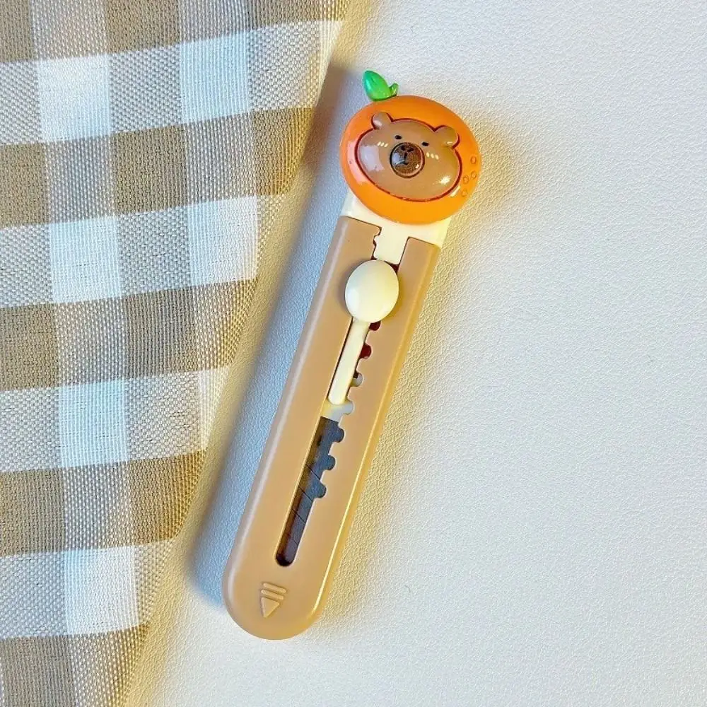 

Новый пластиковый резак в форме головы медведя, мини-инструмент для резки бумаги, канцелярские принадлежности для школы и офиса, мультяшный выдвижной нож для писем