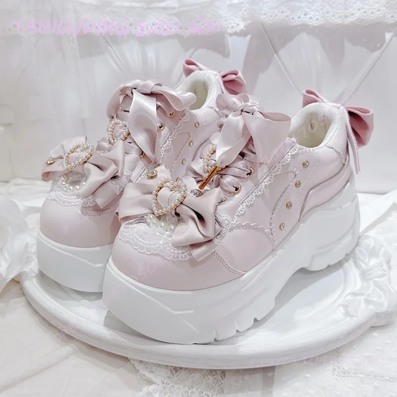 

Cute Lolita Style Sneakers Pink White Sporty Design Platform Soles Black Bow Heart Shaped Details Crystal Buckle Lace White Mesh