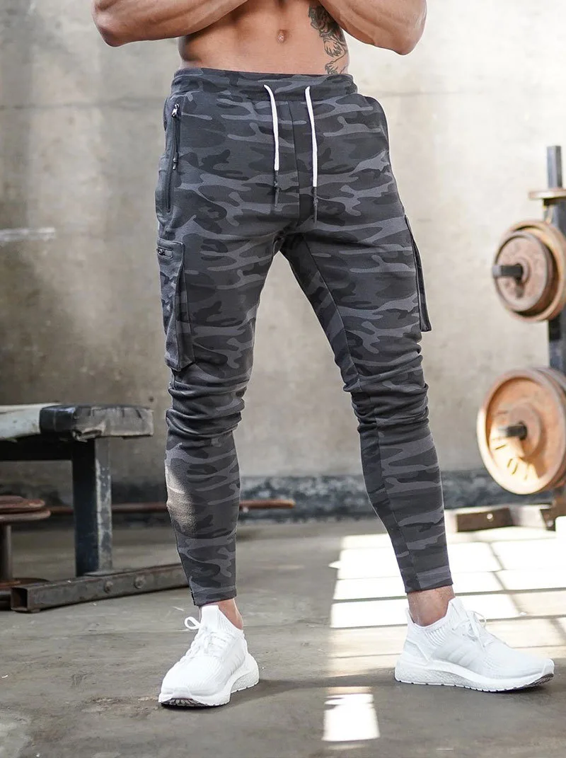 

Multi-pocket Men's Casual Fitness Pants New Style Of Footband Zipper Sports Pants Men's Drawstring Tooling Multi-pocket Solid