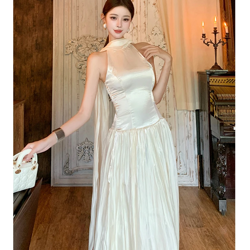 新しい夏のフレンチレトロレディースホルターイブニングパーティードレス女性のセクシーなバックレスノースリーブスリムウエストプリーツドレスvestidos