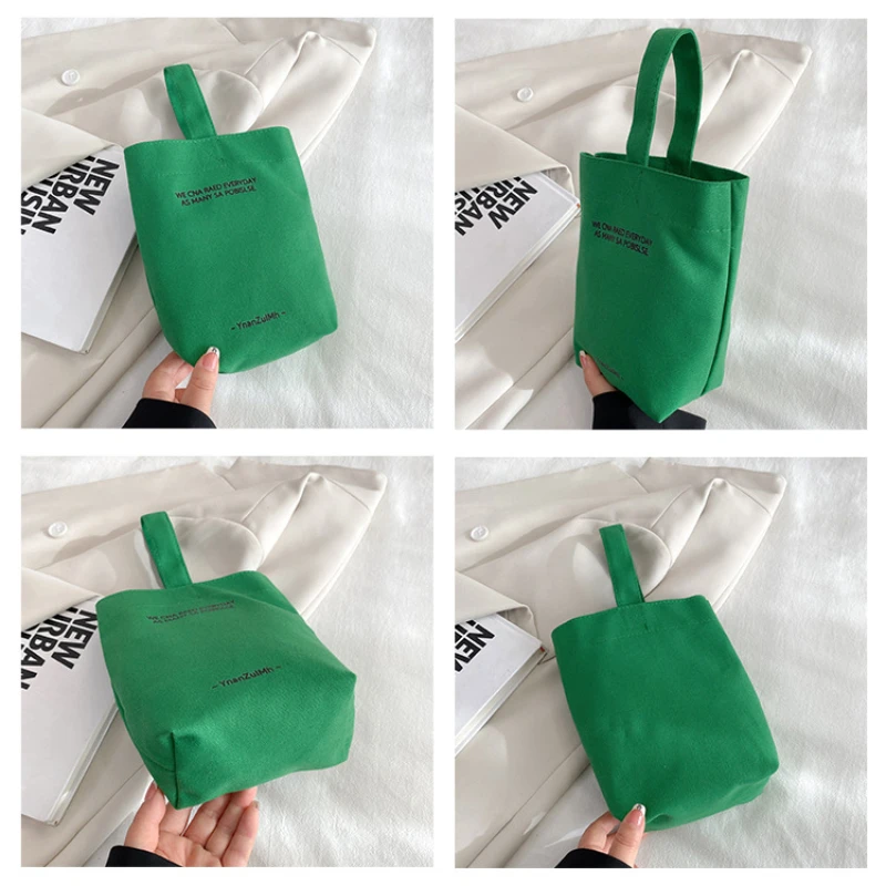 2023 New Minimalist Style Mini Portable Canvas Bag Lunch Bag for Women Handbag Candy Color Kettle Wrist Strap Plain Canvas Bag