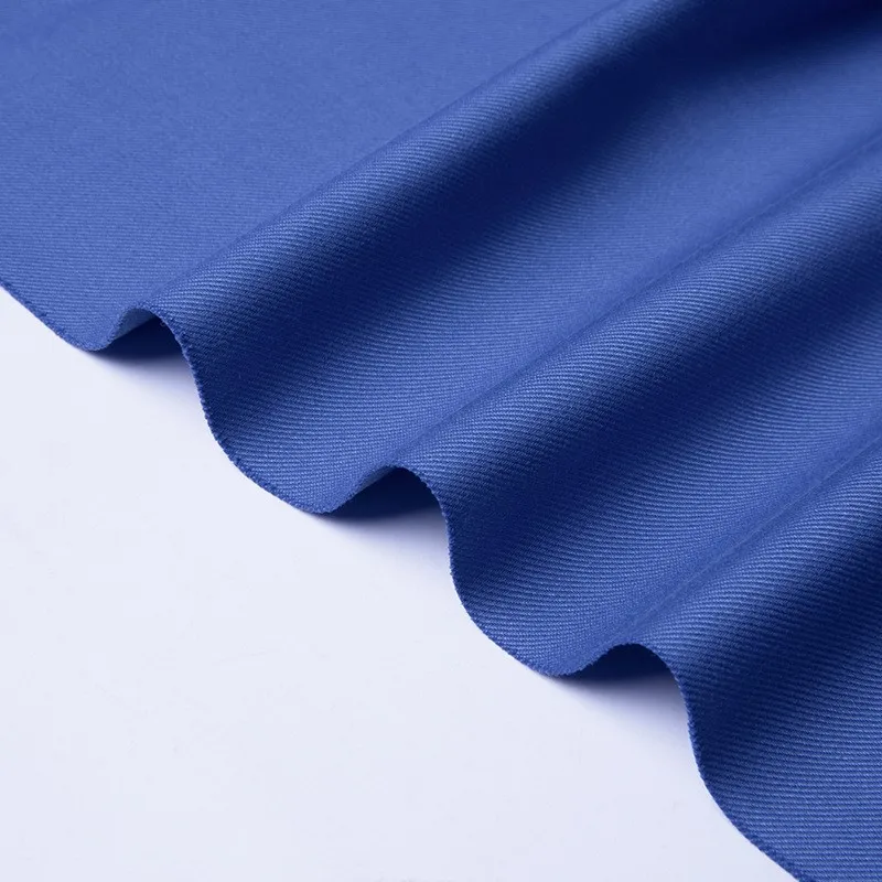 Effen kleur dubbellaags verdikte keperstof voor werkuniformen voor heren- en damespakken