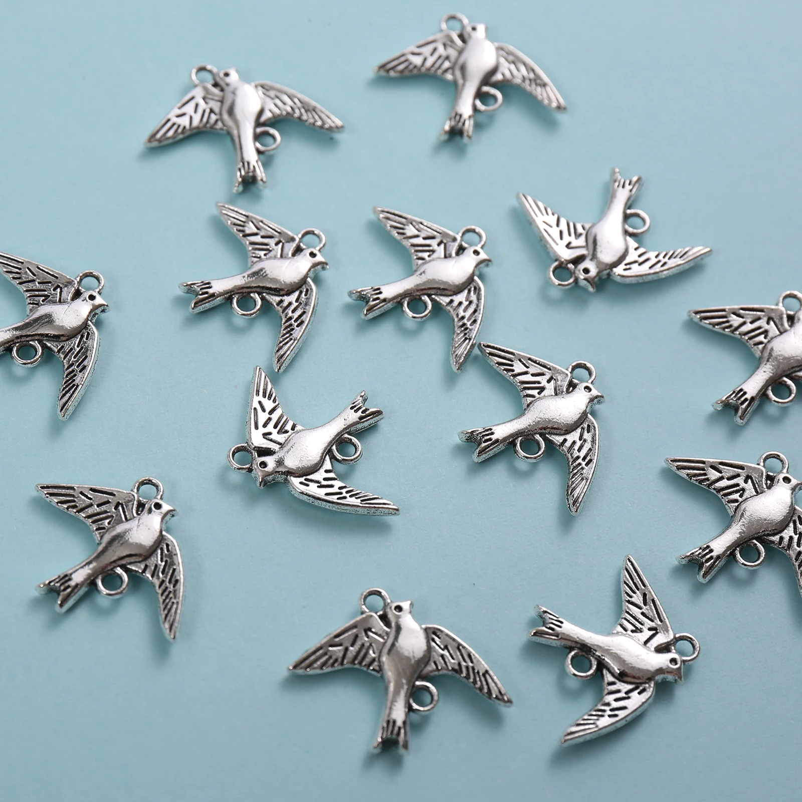 15 Pieces of Vintage-Style Spread-Winged Swallow Pendants with Double Holes, Featuring Wing Patterns and Bird Shapes, Suitable for DIY Bracelets, Earrings, Necklaces, and Artistic Niche Handmade Beading Accessories