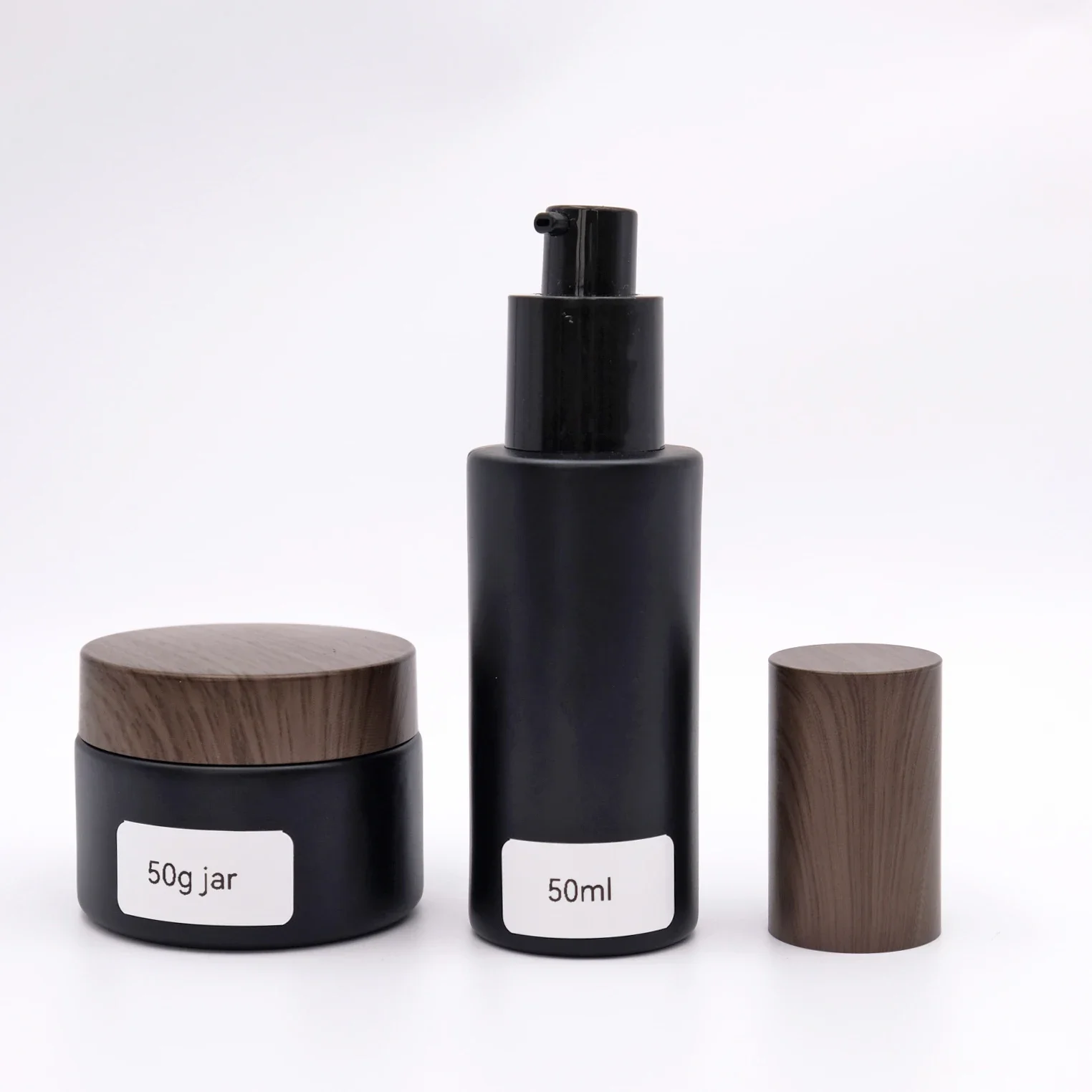 50pcs 120ml High quality Cosmetic Packaging 30ml 50ml 2oz 80ml 100ml Matte Black Glass Lotion Bottles With Dark Wooden Grain Cap