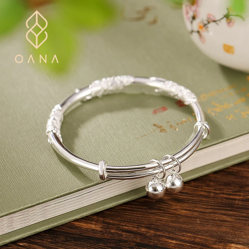 

OANA S999.9 Pure Silver Glossy Fashion Flower Butterfly Bell Retro Filigree Push-Pull Bracelet Jewelry Free Shipping