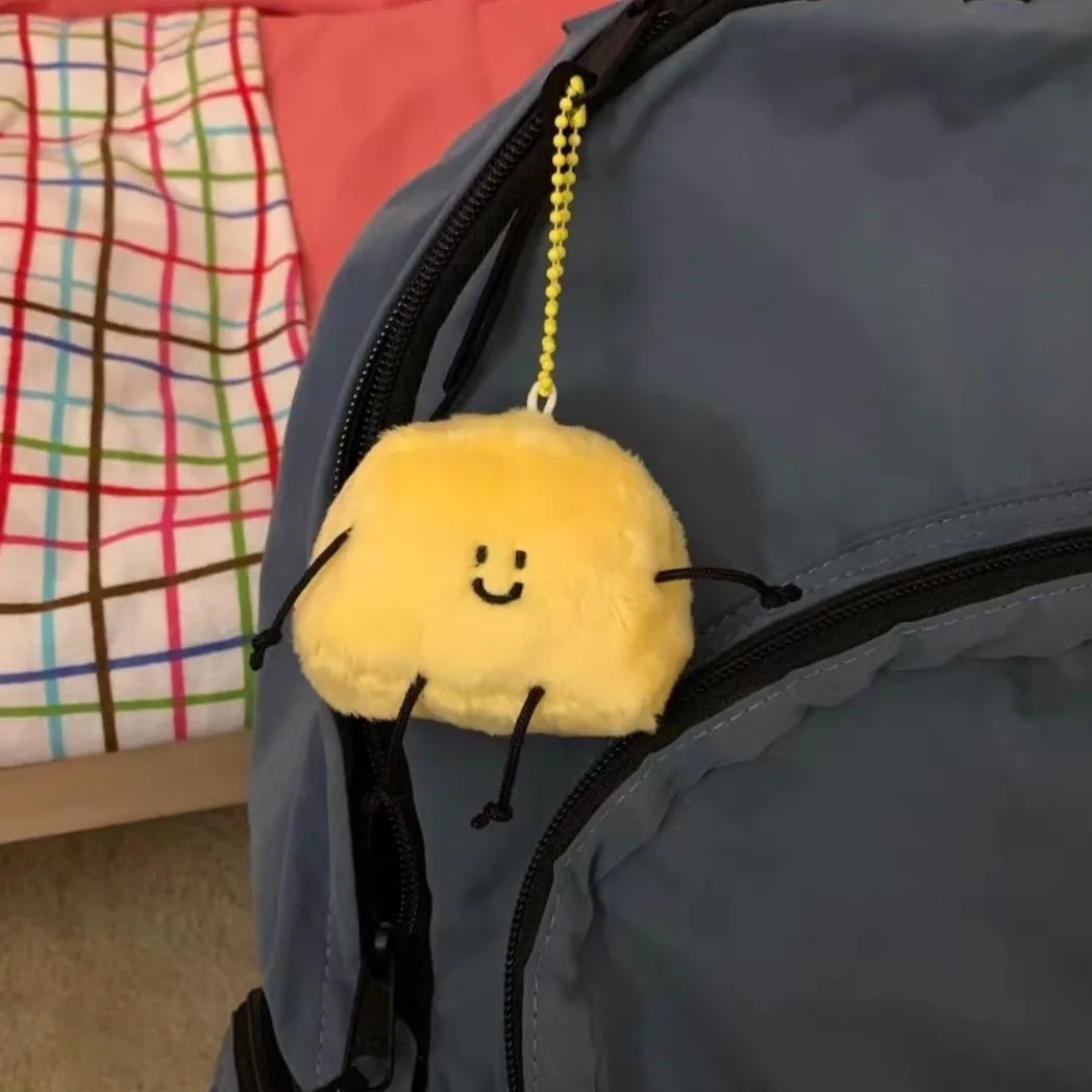 Ciondolo con figurine di burro di cartone animato Borsa in morbida pelle Simpatico portachiavi in peluche Zaino Accessori per bambole Regalo