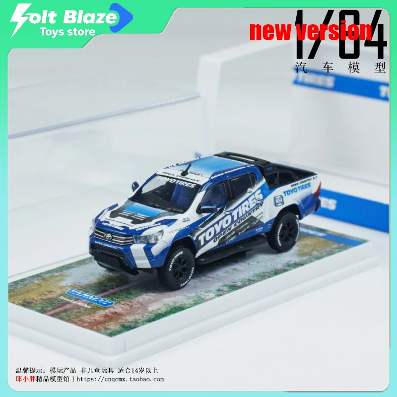 

Tarmac Works 1/64 Toyota Hilux Pickup Truck Toyo Tires Литая под давлением модель автомобиля Имитация комнаты Дисплей Модель из сплава Коллекционная для мальчика