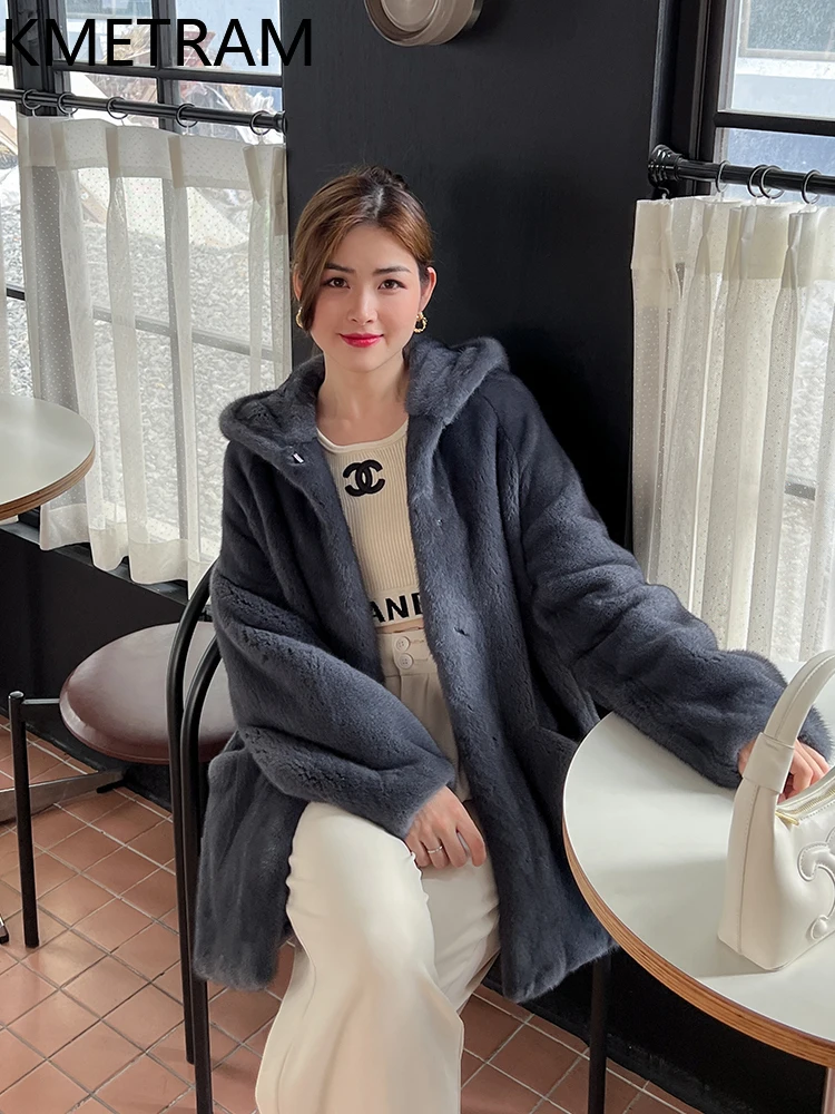 سترة KMETRAM من فرو المنك المخملي ذو العلامة الأرجوانية الطبيعية للنساء معطف فرو حقيقي متوسط الطول مع غطاء محرك السيارة ملابس شتوية 2025 شوروبا