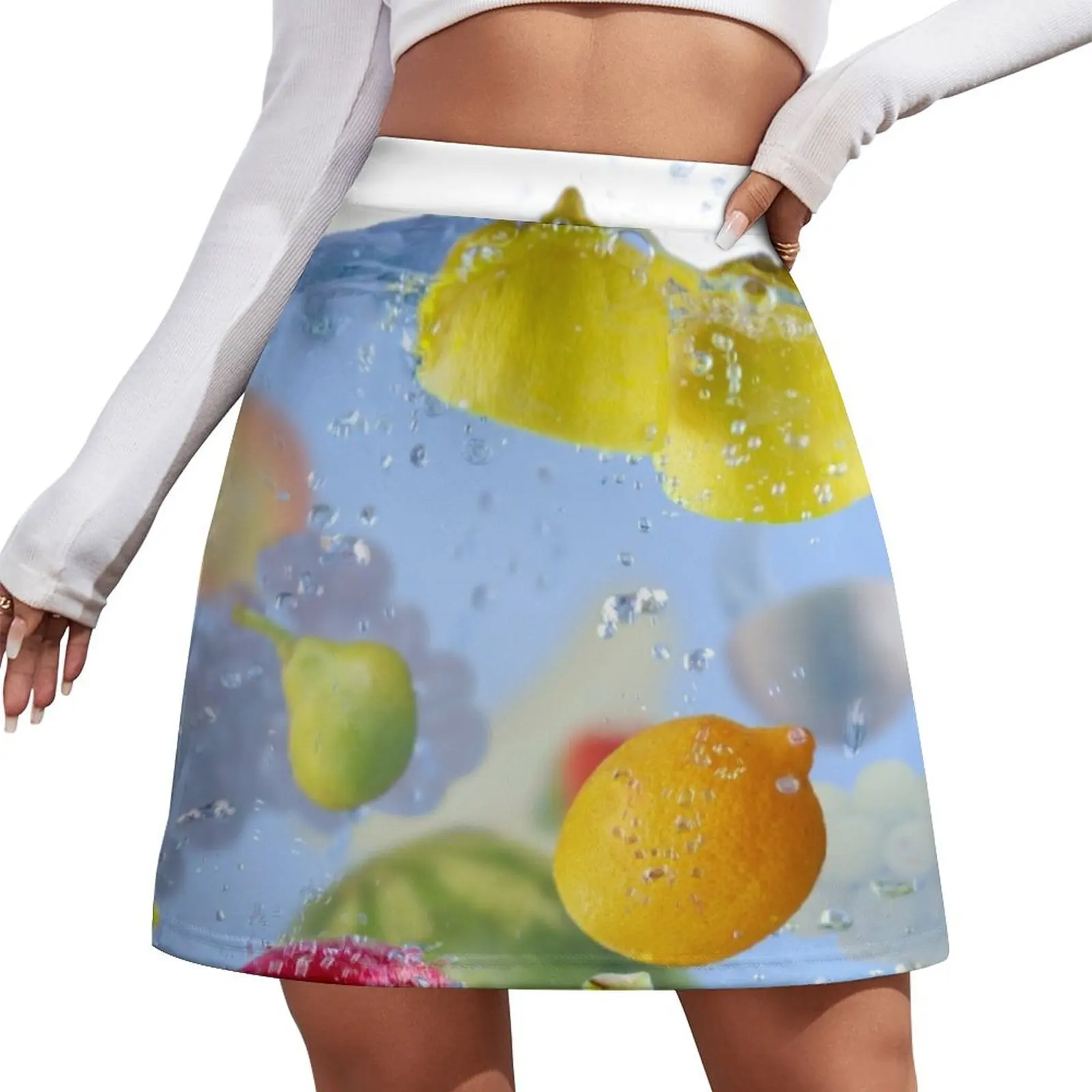 Fresh Fruits shot as they submerged under water background food delicious splash in aquarium Mini Skirt
