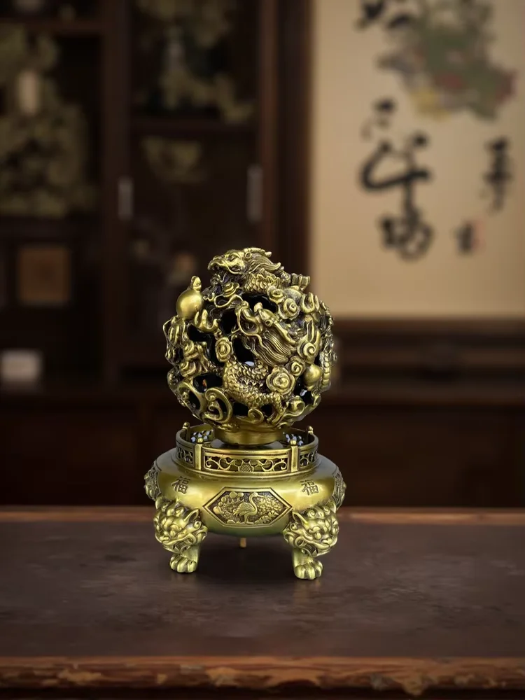Old Brass hollowed-out Dragon statue ball Fortune smiles upon someone. Beast head quadrupedal base Wenfang screen Amass wealth
