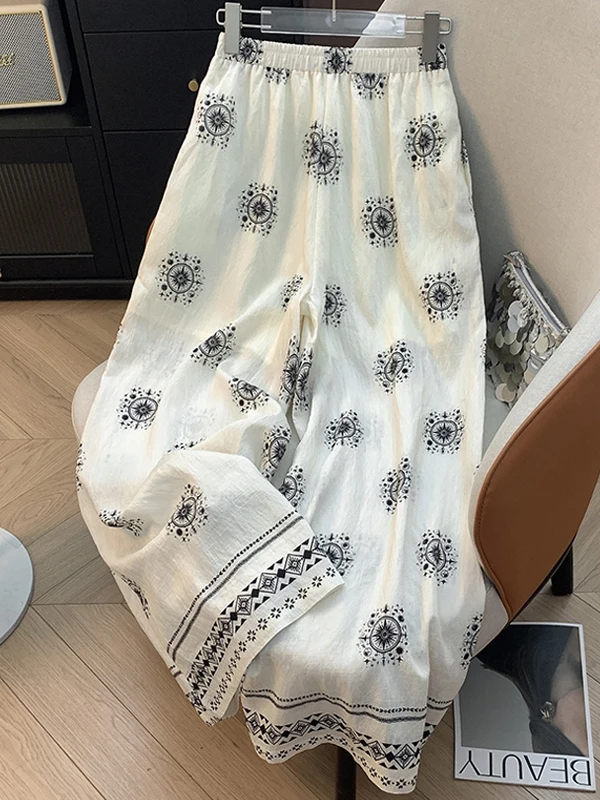 Pantaloni a gamba larga in vita elastica con stampa vintage estiva Pantaloni lunghi dritti casual larghi semplici da donna a vita alta