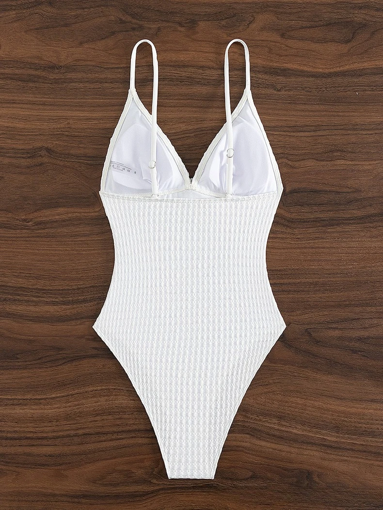 ชุดว่ายน้ําวันพีชเซ็กซี่ลึก V สีทึบใหม่สําหรับผู้หญิง เรียบง่ายและสวยงามสําหรับการว่ายน้ําในวันหยุด ฟิตเนส และอาบแดด