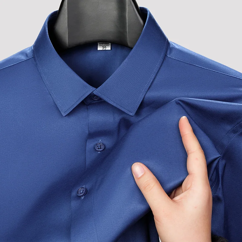 الرجال قميص غير الكي المضادة للتجاعيد الأعمال عادية بلون مطاطا السلس طويلة الأكمام العمل الاجتماعي الأزرق الأبيض فستان قميص 5XL