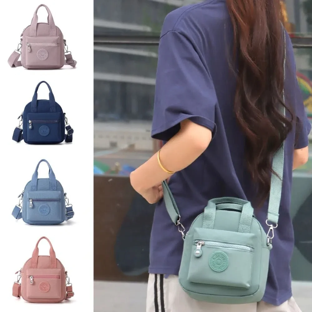 

Multifunctional Crossbody Phone Pouch Handheld Street Style Nylon Shoulder Bag Korean Style Solid Color Small Square Bag Outdoor