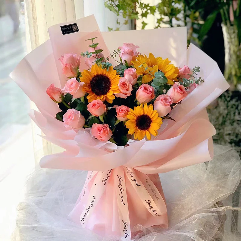 Carta da imballaggio per fiori rosa stile coreano confezione regalo semitrasparente Bouquet da fiorista materiale da imballaggio carta da imballaggio per fiori