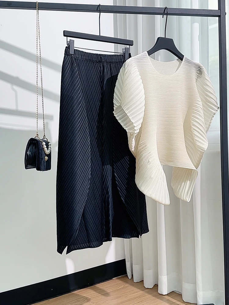 

Новинка: Универсальный модный женский комплект из двух предметов: топ с круглым вырезом и плиссированной юбкой, однотонный, повседневный стиль