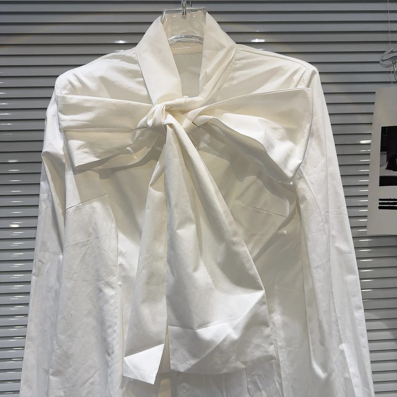 เสื้อผู้หญิงทรงตรง แขนยาว สไตล์ฝรั่งเศส ผ้าระบายอากาศ ดีไซน์ผูกโบว์สีพื้น เรียบหรู ดูอ่อนเยาว์