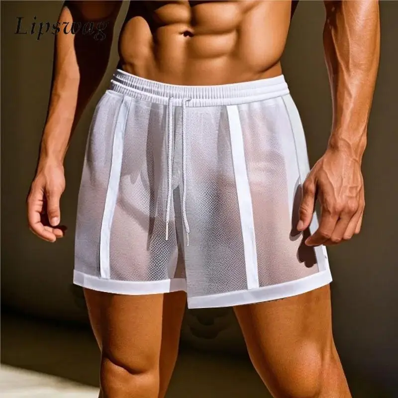 

2025 Spring Summer Seaside Beach Mesh Shorts Men New Casual Breathable Bottoms Men Sexy See Through Loose Drawstring Shorts
