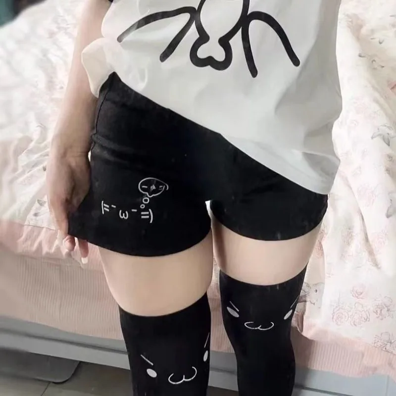 Pantalones cortos de algodón para mujer, pantalones cortos con estampado Kawaii Kaomoji, pantalones cortos informales negros Y2k, moda coreana japonesa, ropa de verano 2024