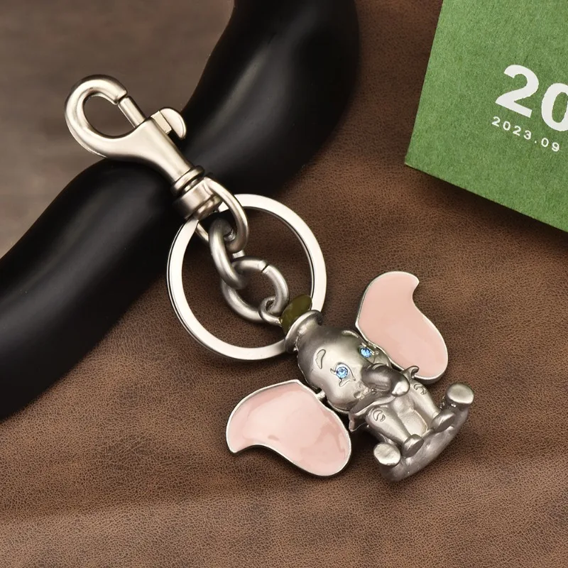 

Metal bag, trailer, metal Dumbo cartoon, cute ears, movable keychain
